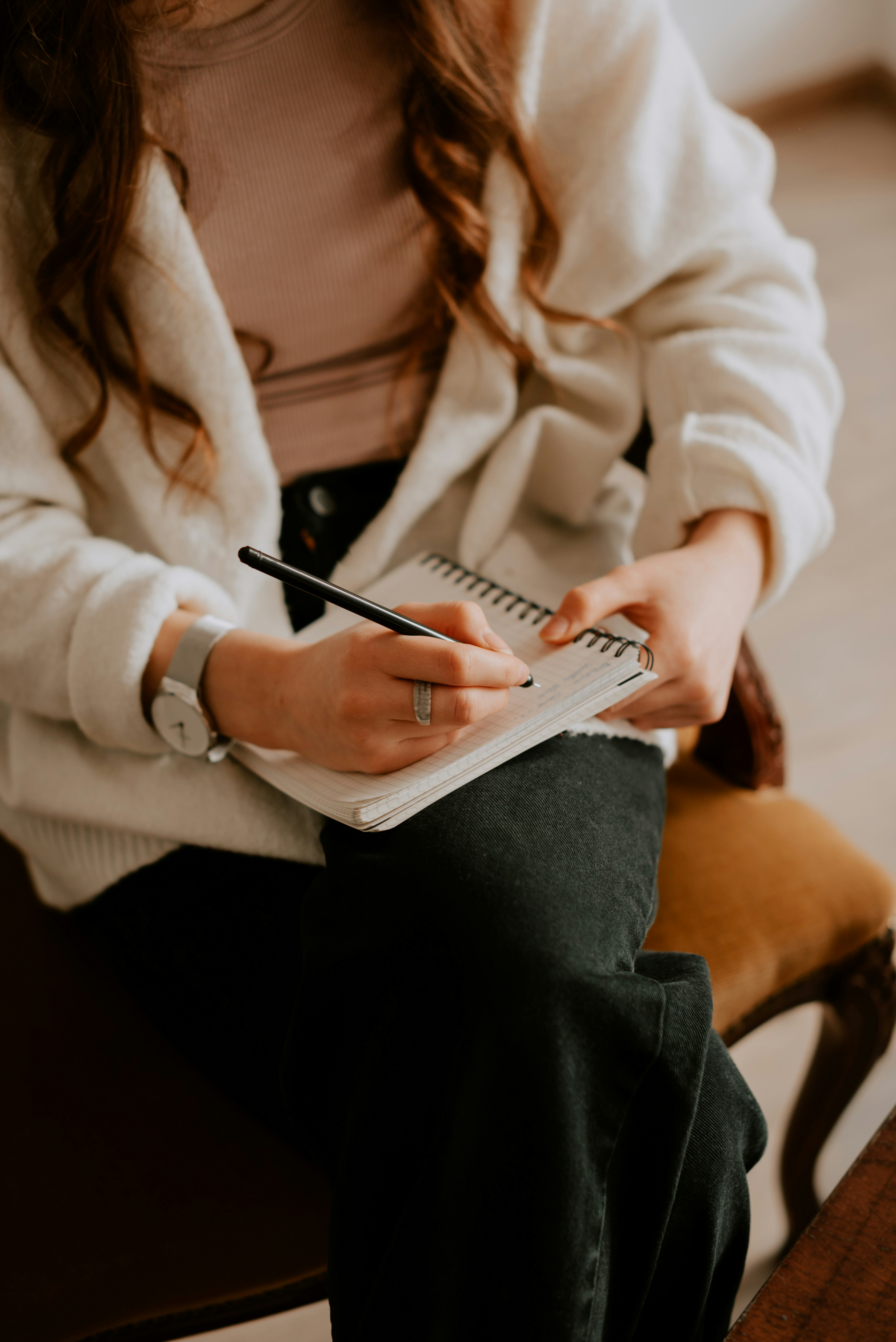 A woman enjoying the benefits of journalling